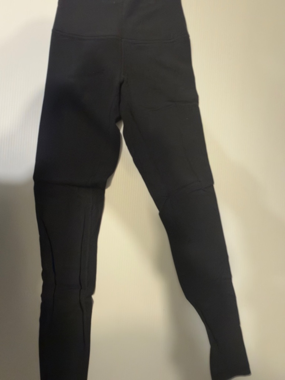 Lululemon women’s black leggings size 4